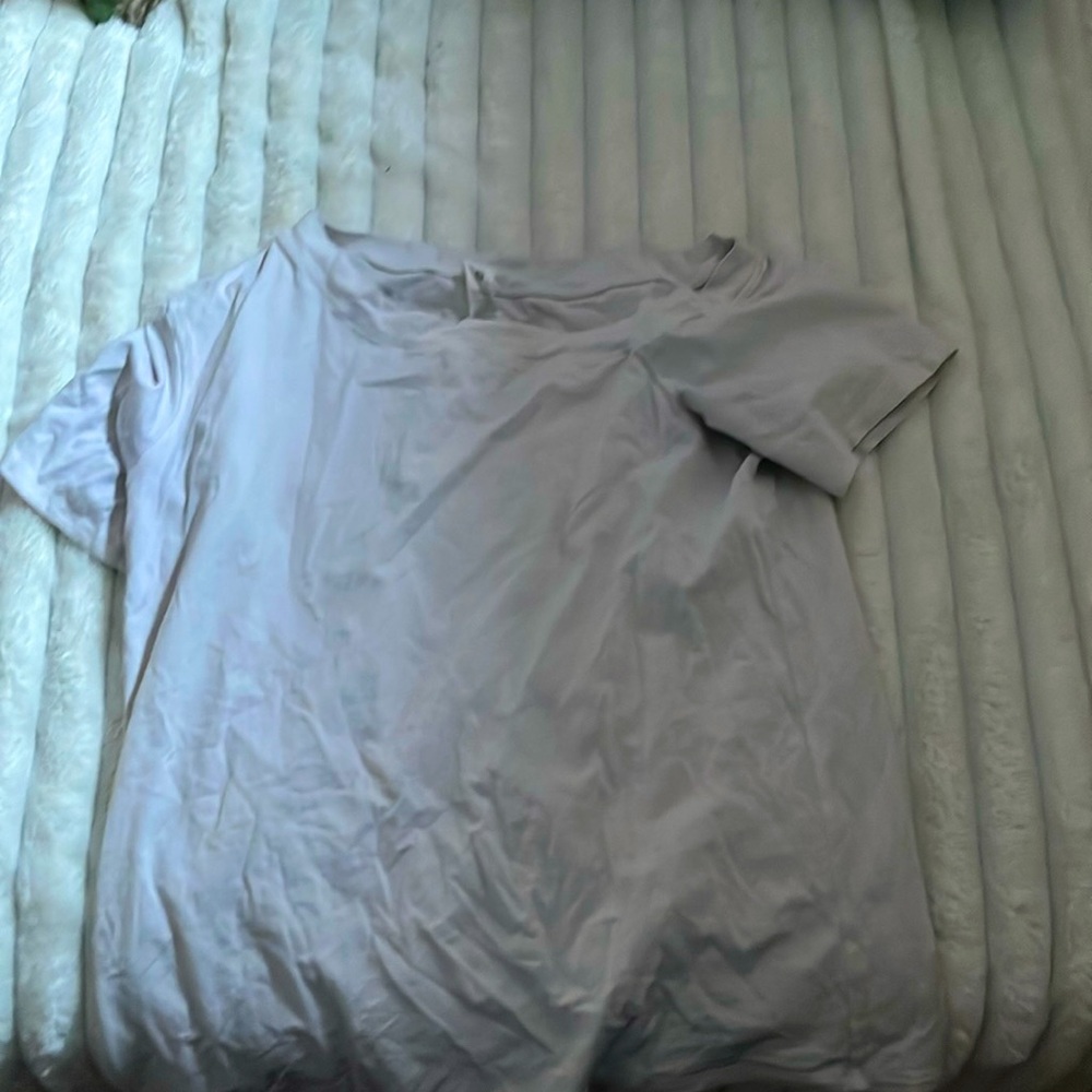 White lulemon top off the shoulder